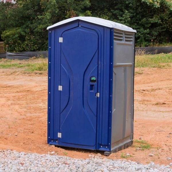 Deluxe flushable portable toilet unit exterior at an outdoor event in Somerville, MA